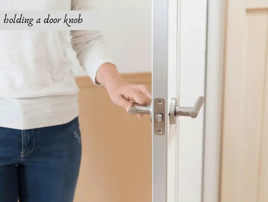 hodling a door knob